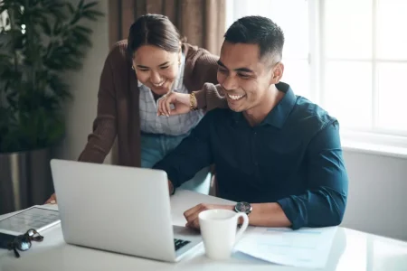 xhappy-with-how-their-finances-are-looking-shot-of-a-young-couple-using-a-laptop-together-at-home-.jpg.pagespeed.ic.MBT1W93H8P